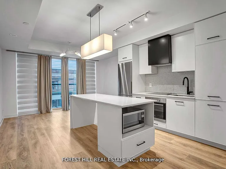899 Queen St E #202 — Photo 5