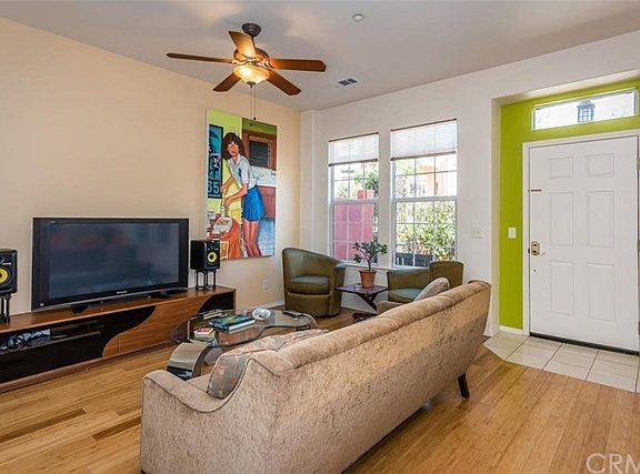 Home offers 9 foot tall ceilings, abundant natural light and bamboo flooring.