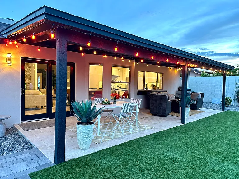 Private Backyard Oasis: 
Dedicated outdoor dining area, and a comfortable sitting space