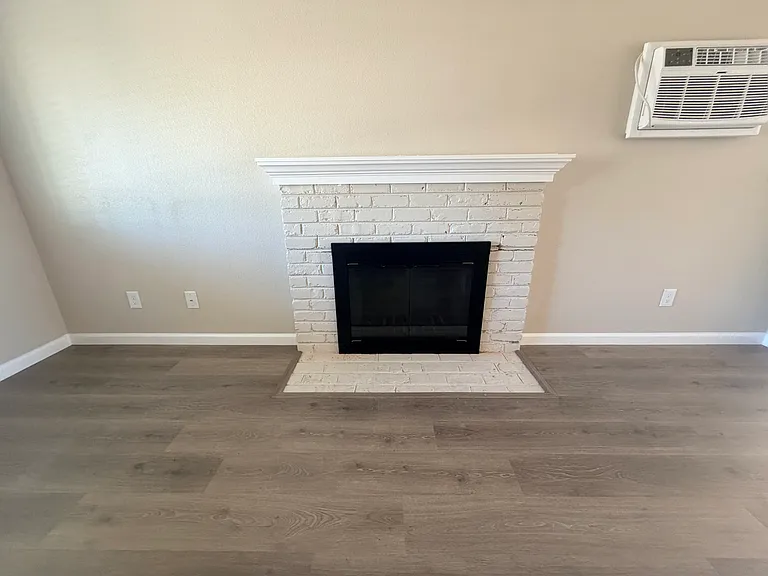 Fireplace and wall a/c.