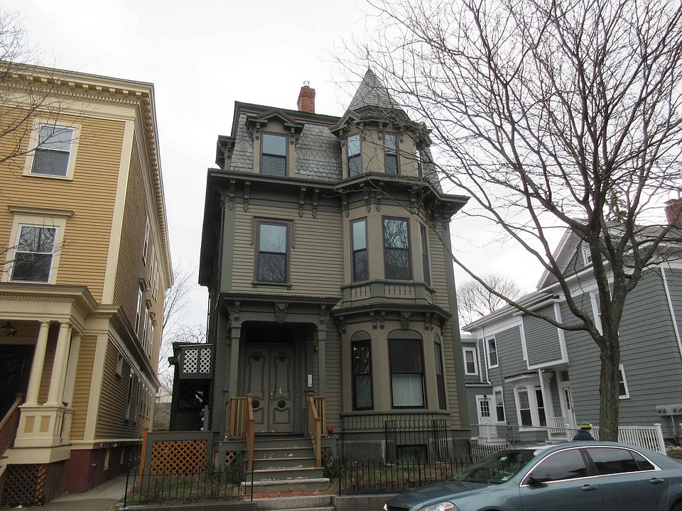 Unit is on the second floor. Window on the left is the kitchen and the bay window on the right is from the main living space.