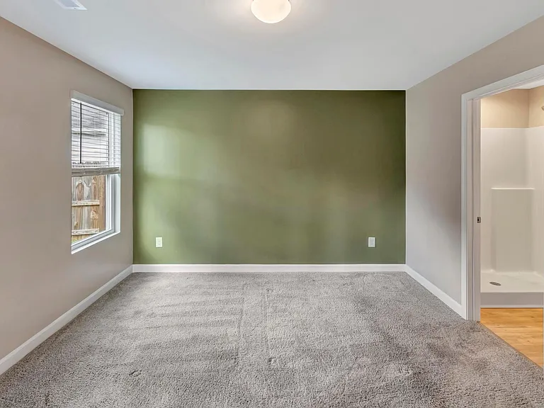 Primary Bedroom will fit a king bed