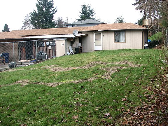 Outbuilding and backyard