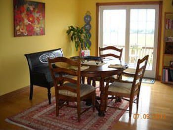 As you step ahead you'll love the dining room, which also offers patio doors that lead out to your deck and private back yard.