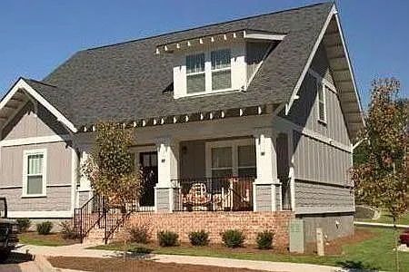 Front of exterior (not accessible from unit) unit is on second floor, entry & parking in rear.