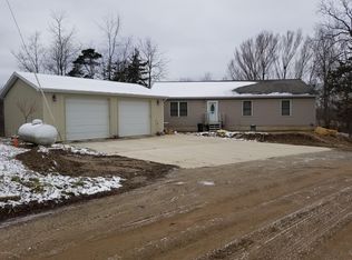 2470 Tripp Rd, Osseo, MI 49266