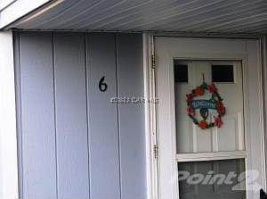 Unit 6 Front Door in Carport Area