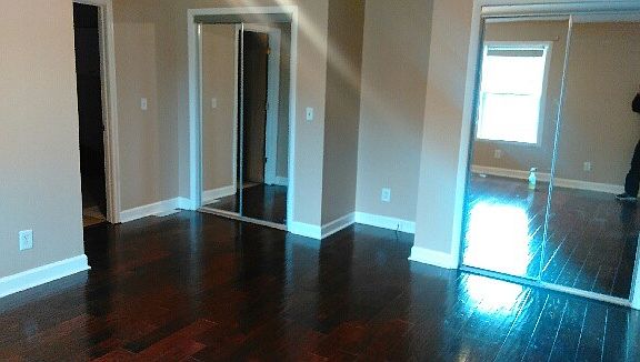 Private rear master bedroom. Two walk in closets w/recessed
