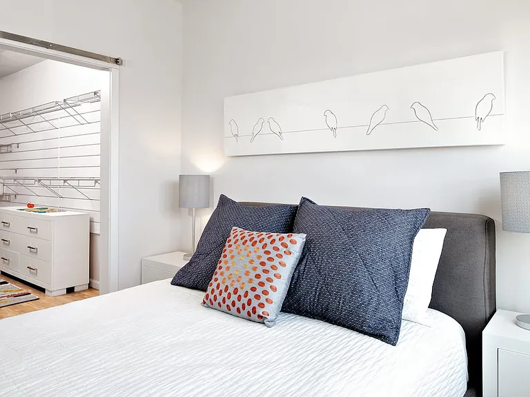 Bedroom with walk-in customizable closets