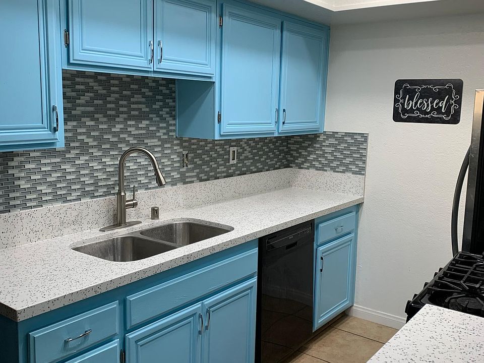 Kitchen has been upgraded with stainless steel stove and microwave. Dishwasher included. Recessed lighting .