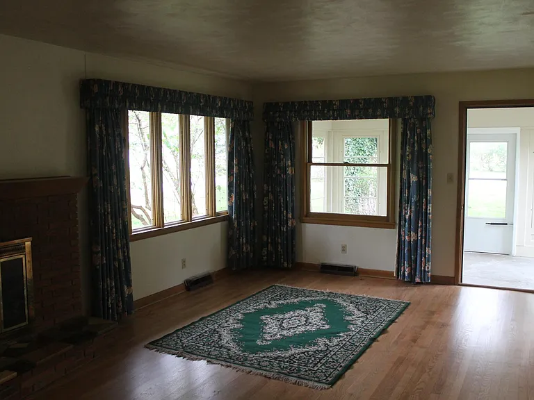 Living room looking out to sun porch