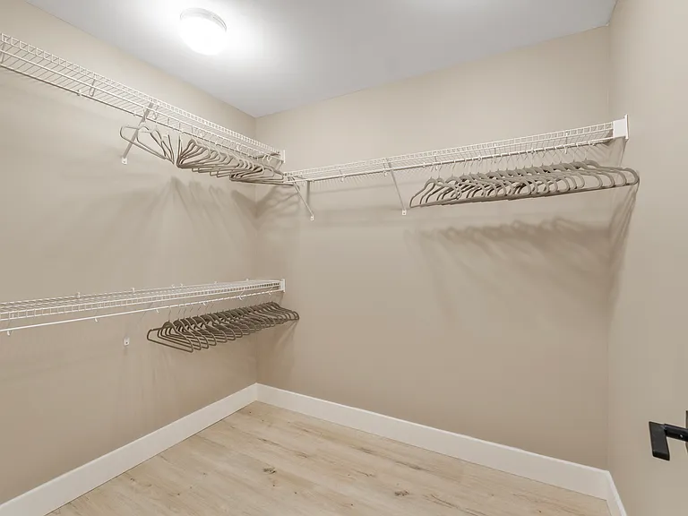 Walk-in closet off the Primary Bathroom