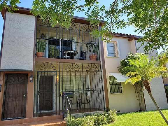 Building Front 2nd View. Upper unit rental balcony