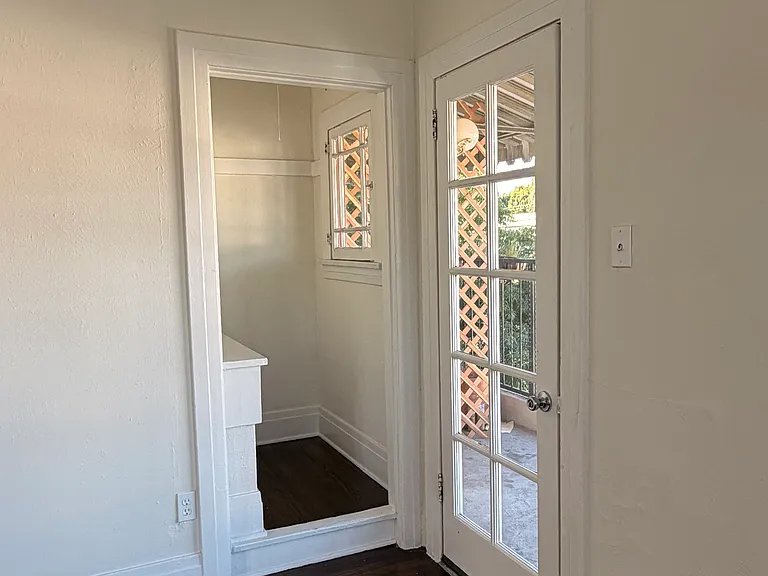 door to front patio and nook from the living room
