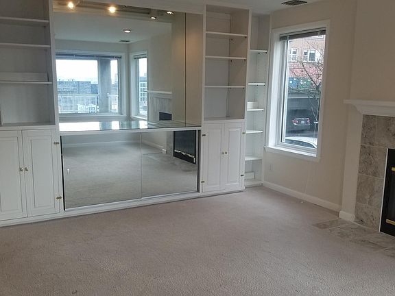Back of living room with built-in cabinet