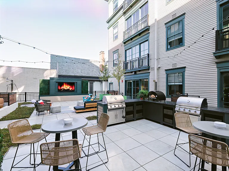 Enjoy our gas grills, outdoor pizza oven, and out door TV and lounge.