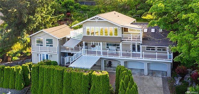 Westside View Home!  Enjoy morning sunrises over Mt. Rainier, walks to Bayview Market or West Bay Park where you can enjoy the waterfront, picnic tables and launch a kayak.  Over 3,600 square feet which includes the 2 story (432 sq. ft.) carriage house (perfect for guests). Over size garage plus carport, storage space and shop area.