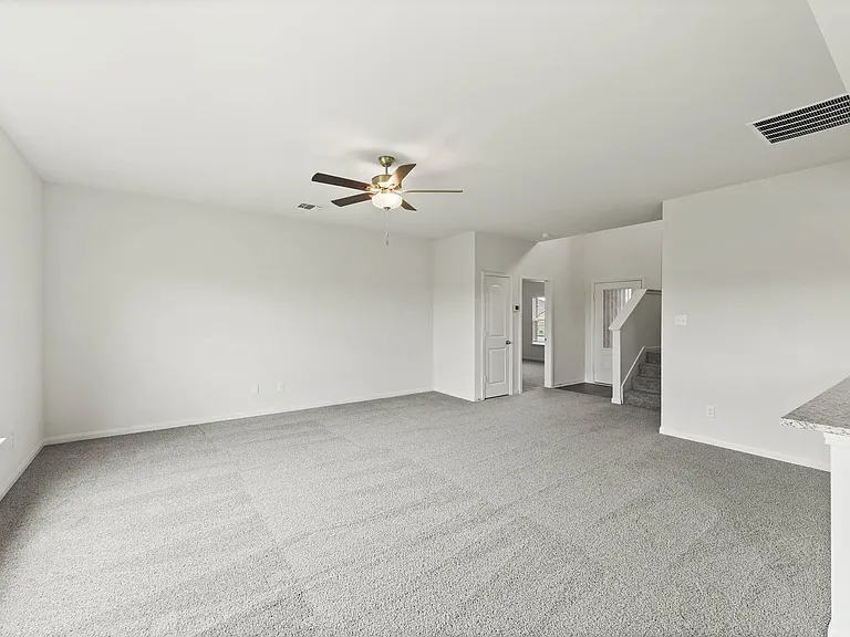 The spacious family room is perfect for everyday family living and hosting.