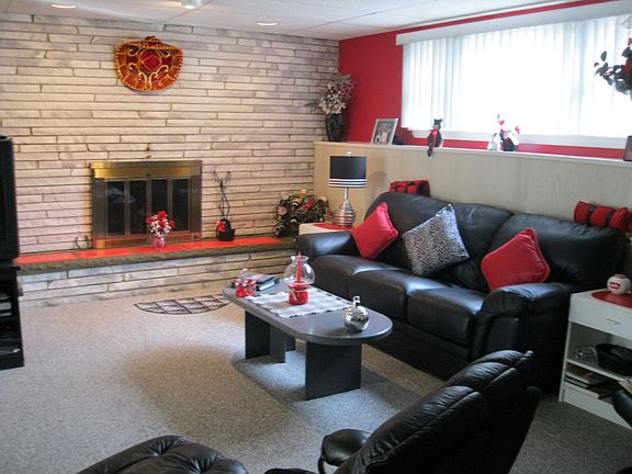 Playroom wall-length marble fireplace