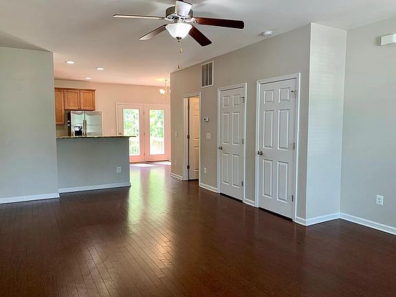 Living room looking towards the kitchen and dining area