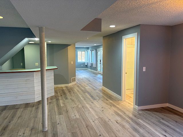 Bar feature that can be used as additional closet space.