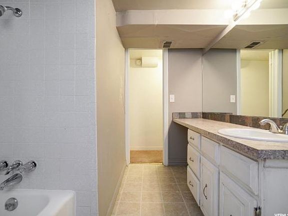 Deep bathroom with plenty of storage