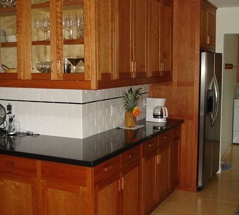 Custom cherry kitchen...stainless appliances and bamboo floors