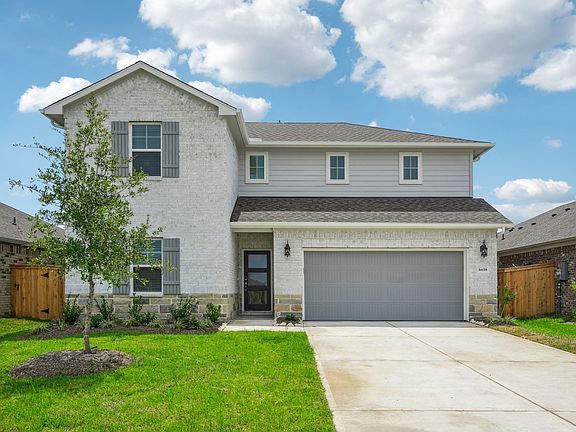 The front exterior of a home in Wall Street Village of Richmond, TX.