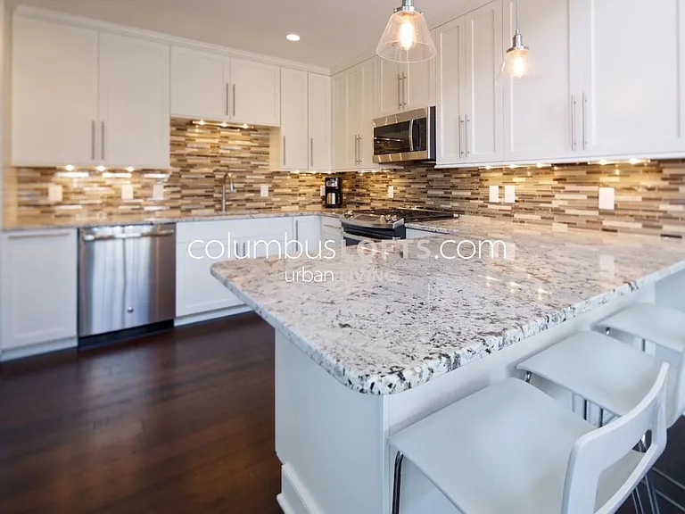 kitchen including peninsula breakfast bar