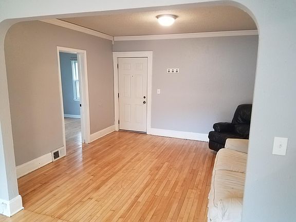 Large, bright living room with lots of natural light.
