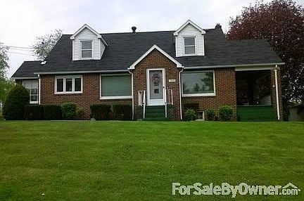 Brick Cape Cod with view of the city!
						:
						Large home is suitable for a family or someone who wants lots of space.