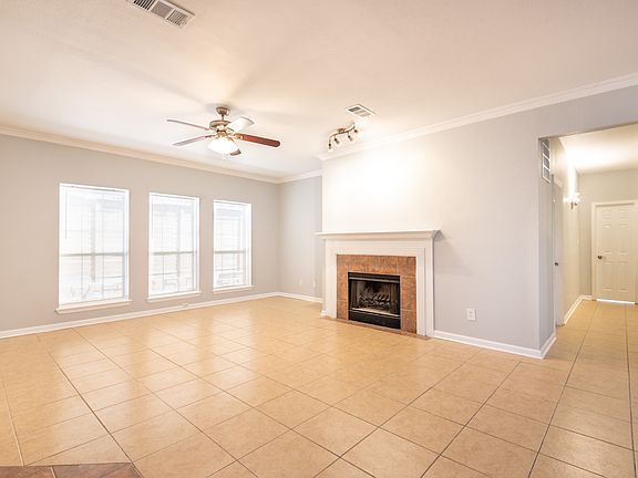Open concept Floor Plan with tile flooring throughout for care-free maintenance.