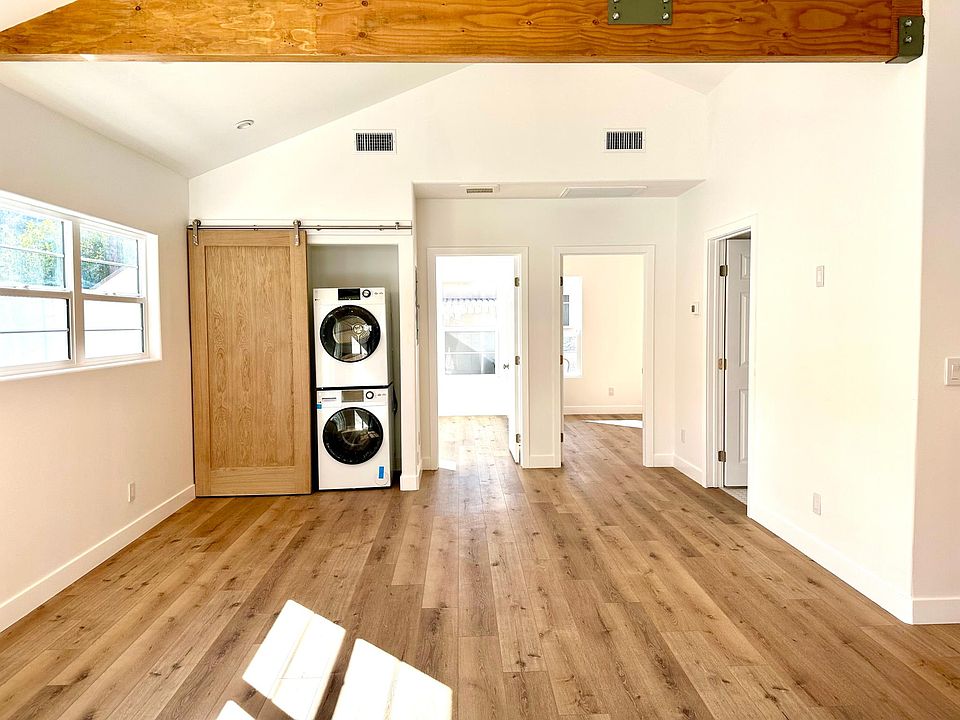 Living Area with stackable washer/dryer