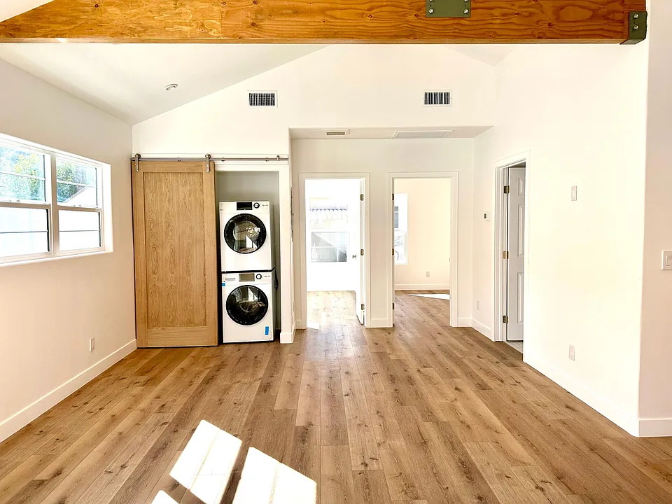 Living Area with stackable washer/dryer