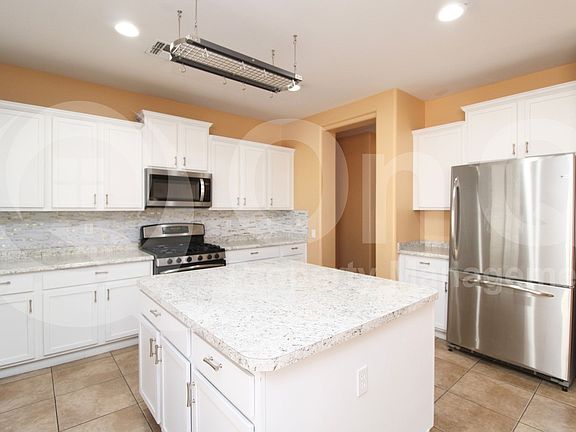 3rd image of 14205 W Mauna Loa Ln