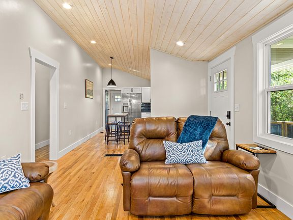 Vaulted ceilings throughout the house create an open, airy environment.