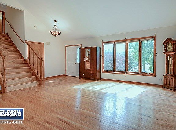 You'll Love the Vaulted Ceilings in the Living Room which opens to the Dining Room. Red Oak Hardwood