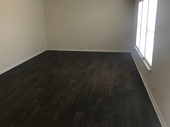 Living room looking from breakfast nook which is part of the kitchen