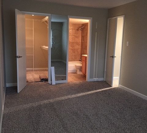 Master bedroom with full bath and walk in closet