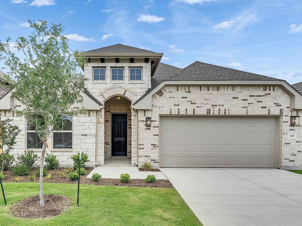 Sophisticated stone facade, arched entrance, and elegant gabled roof define this Oaks at San Gabriel