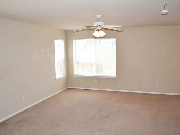 Entry leads into an open living room.