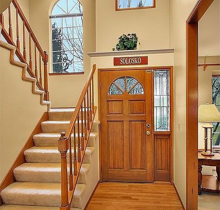 Welcoming entry with 2-story ceiling and hardwoods.