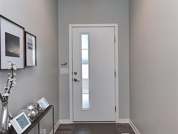 LVT flooring. Barn door.  Decorator colors.