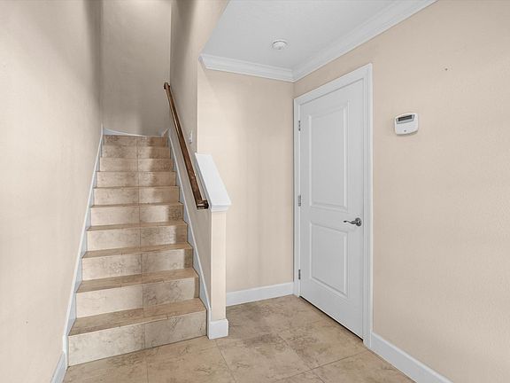 Stairway from ground level to main level