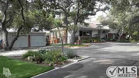 Gorgeous setting for this 5 bedroom, 4 bath split-level home with 3 fireplaces and a private 'Granny