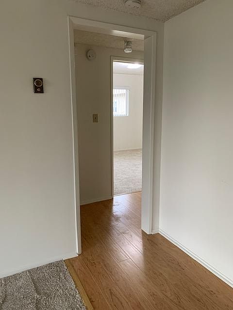 All brand new laminate floors & new soft carpeting & freshly painted