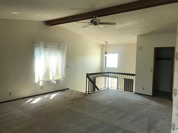 Living room with walk-in storage closet