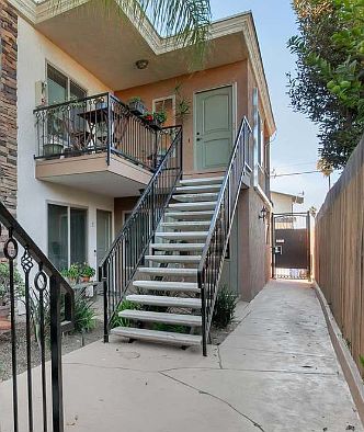 Top unit with a front and back private gate for entry.