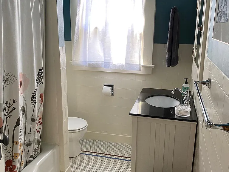 Original tub, tile and medicine cabinet