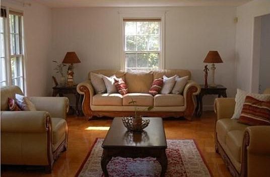 Formal Living room. When you enter home, this is on left side. Large windows inviting sunlight. From living room you can go to dining room and then to Patio